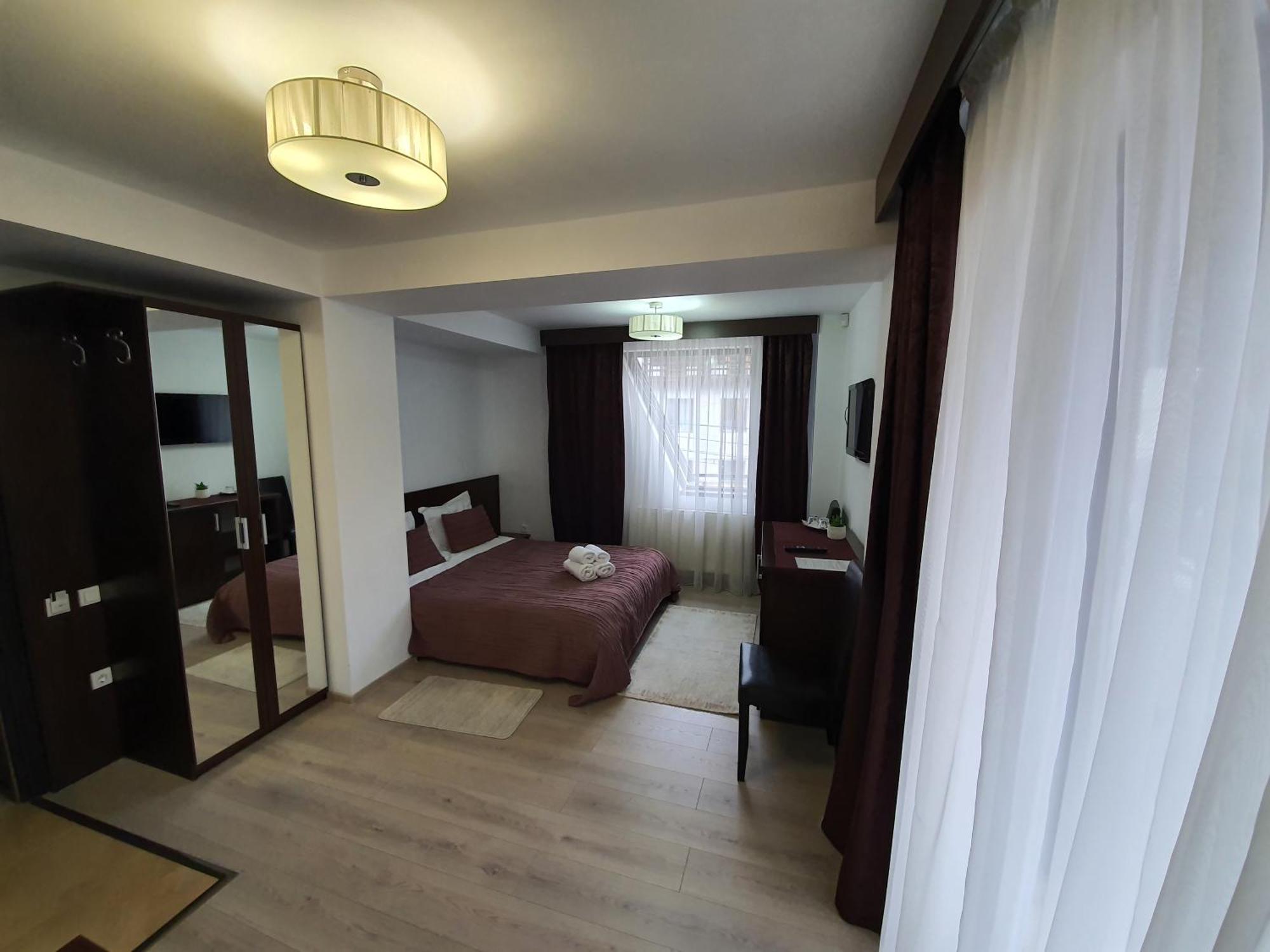 Pensiunea Public House Буштени Номер фото