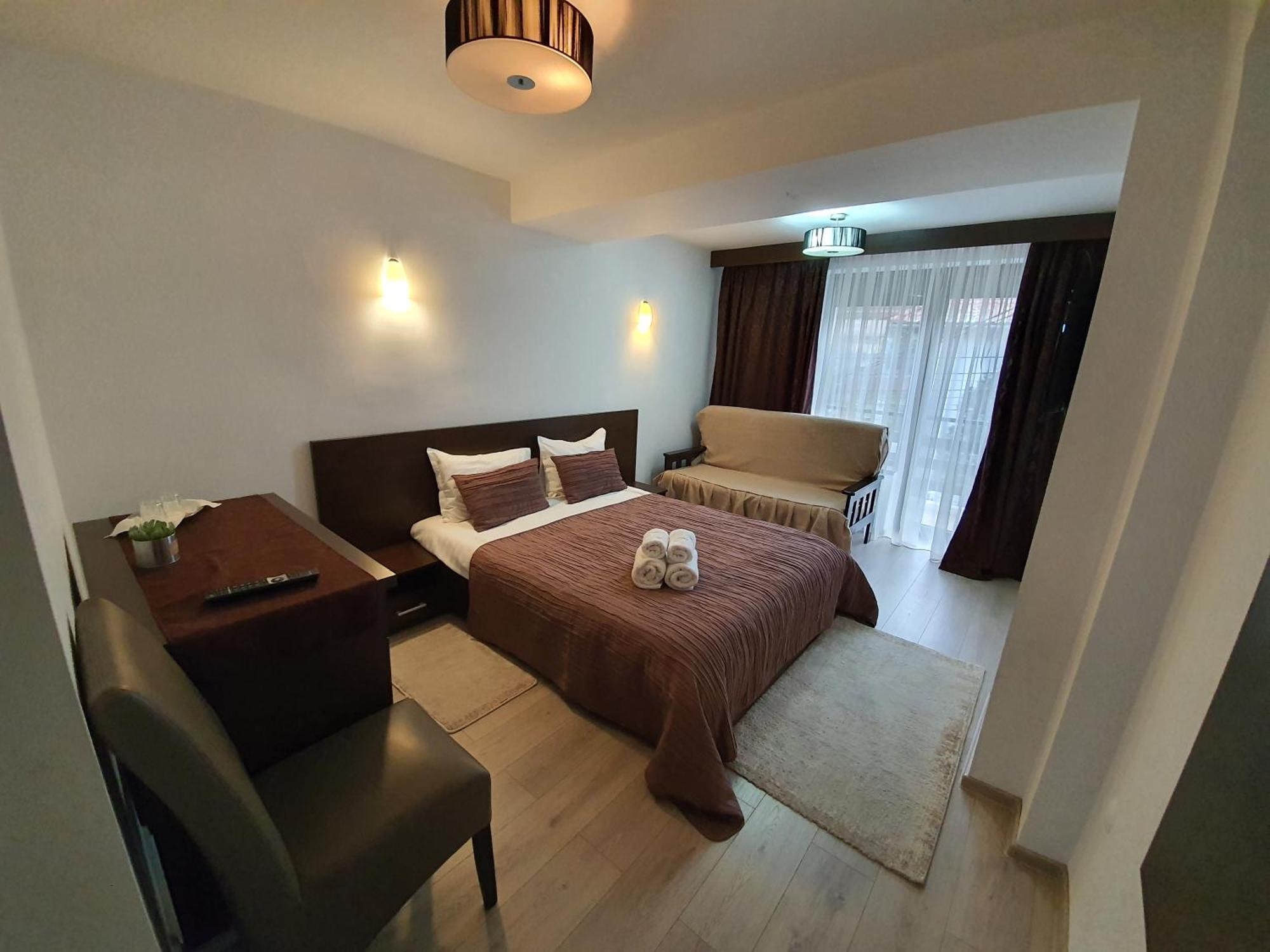 Pensiunea Public House Буштени Номер фото